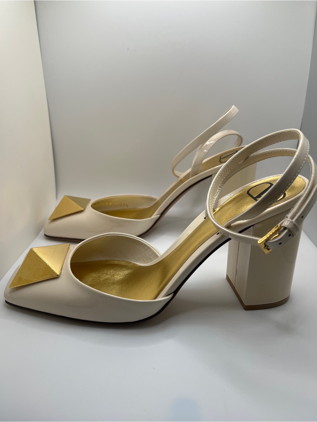 Ivory Slingback Block Heels With Gold Pyramid Accent